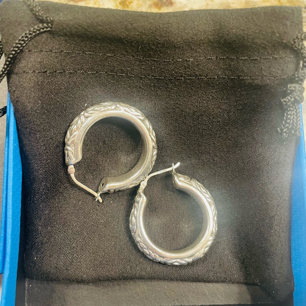 Sterling silver hoop earrings. NWT. Never worn.